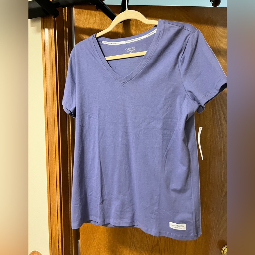 Calvin Klein Performance periwinkle Tee. NWT. Sz L